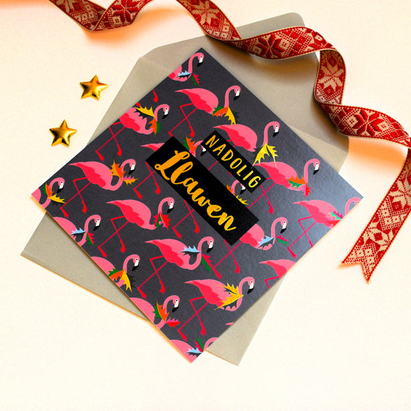 Welsh Christmas Card, Flamingoes and Holly, text foiled in shiny gold